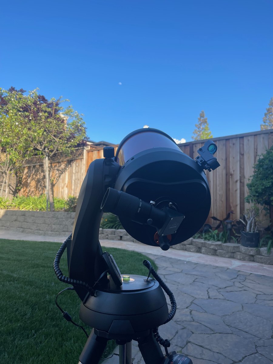 Telescope under a blue sky